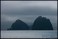 Islands emerging from fog, Aialik Bay. Kenai Fjords National Park, Alaska, USA.