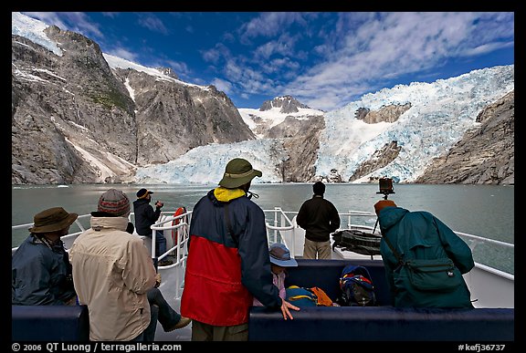 Passengers on the deck of tour boat and Northwestern glacier, Northwestern Lagoon. Kenai Fjords National Park (color)