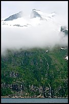 Cloud-covered peak and waterfalls, Northwestern Fjord. Kenai Fjords National Park, Alaska, USA.