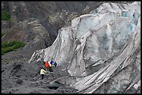 Family exploring at the base of Exit Glacier. Kenai Fjords National Park, Alaska, USA.