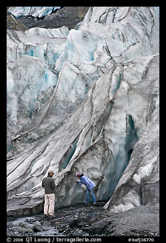 Couple checking out the ice at the terminus of Exit Glacier. Kenai Fjords National Park (color)