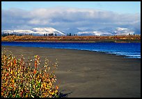 Kobuk River and Baird mountains with fresh dusting of snow, morning. Kobuk Valley National Park, Alaska, USA.