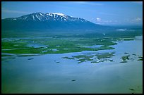 Aerial view of estuary and snowy peak. Lake Clark National Park, Alaska, USA.