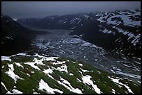 Aerial view of Tikakila River valley under dark clouds. Lake Clark National Park, Alaska, USA. (color)