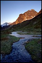 Stream on plain  below the Telaquana Mountains, late afternoon. Lake Clark National Park ( color)