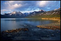Stream flowing into Turquoise Lake, sunset. Lake Clark National Park, Alaska, USA. (color)