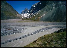 Wide stream at the junction of valleys below the Telaquana Mountains. Lake Clark National Park ( color)