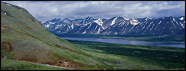Summer mountain landscape with cloudy skies. Lake Clark National Park (Panoramic color)
