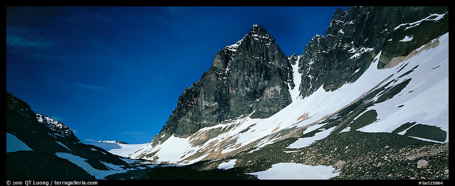 Rocky peaks with early summer snow. Lake Clark National Park, Alaska, USA.