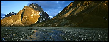 Stream, gravel bar, and mountains at sunset. Lake Clark National Park (Panoramic color)