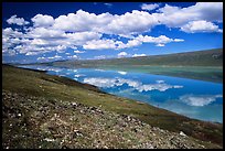 Turquoise Lake and clouds. Lake Clark National Park, Alaska, USA.