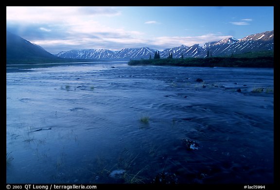 River flowing out of Twin Lakes at sunrise. Lake Clark National Park, Alaska, USA.