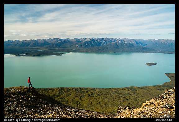 Visitor looking, Lake Clark from Tanalian Mountain. Lake Clark National Park, Alaska, USA.