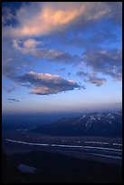 Clouds, glacier, and mountains seen from above. Wrangell-St Elias National Park, Alaska, USA.