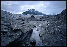 Mt Donoho above moraine, stream, and Root glacier. Wrangell-St Elias National Park, Alaska, USA. (color)