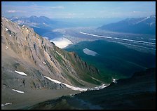 View over hazy Chugach mountains and Kennicott Glacier from Donoho Peak. Wrangell-St Elias National Park, Alaska, USA.