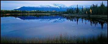 Pond and reflected mountains at dusk. Wrangell-St Elias National Park (Panoramic color)