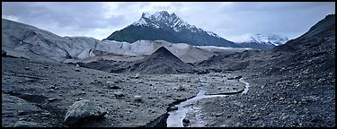 Glacial landscape with stream and moraine. Wrangell-St Elias National Park, Alaska, USA.