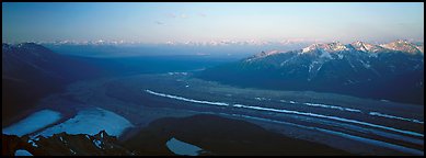 Elevated view of glacier terminal section and mountains. Wrangell-St Elias National Park (Panoramic color)