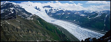 Elevated view of glacier descending from mountain. Wrangell-St Elias National Park, Alaska, USA.