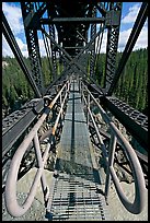 Foot catwalk below the Kuskulana river bridge. Wrangell-St Elias National Park, Alaska, USA. (color)