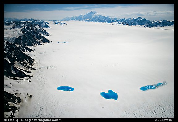 Aerial view of Bagley Field with turquoise snow melt lakes. Wrangell-St Elias National Park, Alaska, USA.