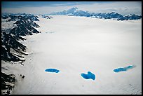 Aerial view of Bagley Field with turquoise snow melt lakes. Wrangell-St Elias National Park, Alaska, USA.