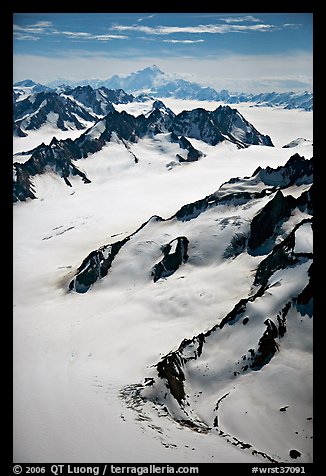 Aerial view of mountains with Mt St Elias in background. Wrangell-St Elias National Park, Alaska, USA.