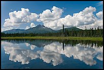 Clouds, mountains, and reflections. Wrangell-St Elias National Park, Alaska, USA.