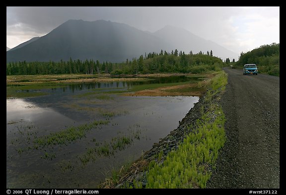 McCarthy Road and lake during afternoon storm. Wrangell-St Elias National Park, Alaska, USA.