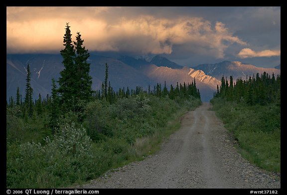 Nabena road at sunset with last light on mountains. Wrangell-St Elias National Park, Alaska, USA.