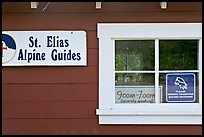 Mountain guide office with interesting signs. Wrangell-St Elias National Park, Alaska, USA.