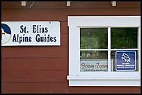 Mountain guide office with interesting signs. Wrangell-St Elias National Park, Alaska, USA. (color)