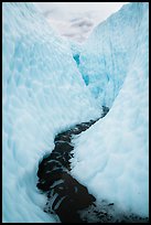 Glacial stream between steep walls of ice, Root Glacier. Wrangell-St Elias National Park ( color)