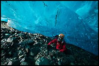 Mountaineer below blue ice cave ceiling. Wrangell-St Elias National Park ( color)