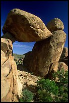 Arch formed by balanced boulder, Grapevine mountains. Big Bend National Park, Texas, USA. (color)