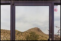 Santiago mountains, Persimmon Gap Visitor Center window reflexion. Big Bend National Park, Texas, USA. (color)