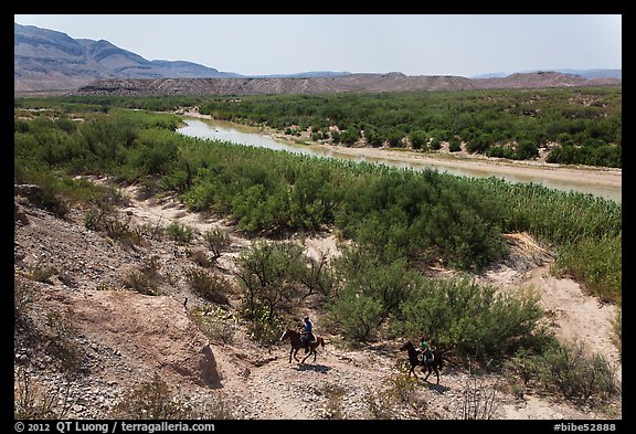 Mexican nationals crossing border on horse. Big Bend National Park, Texas, USA.