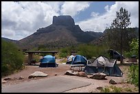 Cluster of tents fills Chisos Basin Campground under Casa Grande. Big Bend National Park ( color)