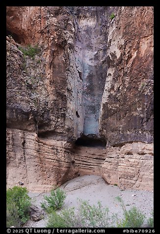 A wider view of the Burro Mesa pour-off reveals sculpted rock layers and the pale chute where seasonal floods plunge into the amphitheater below. Big Bend National Park (color)