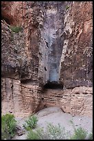 A wider view of the Burro Mesa pour-off reveals sculpted rock layers and the pale chute where seasonal floods plunge into the amphitheater below. Big Bend National Park ( color)
