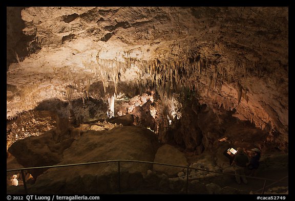 Tourists looking at Green Lake room from above. Carlsbad Caverns National Park (color)