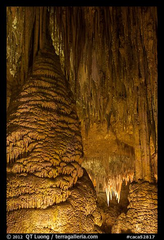 Stalagmite and flowstone framing chandelier. Carlsbad Caverns National Park, New Mexico, USA.