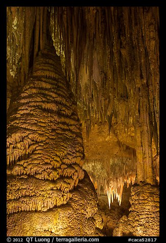 Stalagmite and flowstone framing chandelier. Carlsbad Caverns National Park (color)