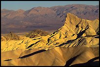 Manly beacon, Zabriskie point, sunrise. Death Valley National Park, California, USA. (color)