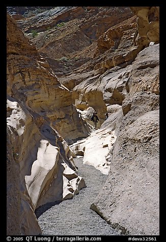 Hikers in slot, Mosaic canyon. Death Valley National Park, California, USA.