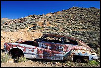 Car with bullet holes near Aguereberry camp, afternoon. Death Valley National Park, California, USA.