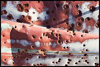 Detail of car with bullet holes near Aguereberry camp, afternoon. Death Valley National Park, California, USA. (color)