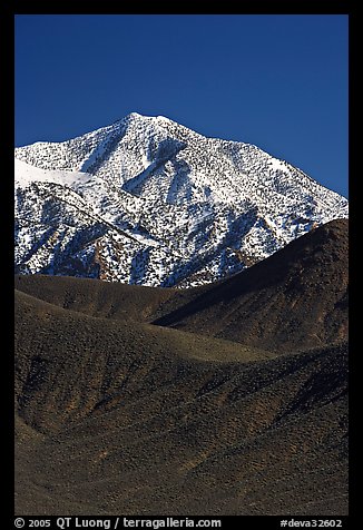 Telescope peak rising above sage-covered hills. Death Valley National Park, California, USA.