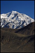 Telescope peak rising above sage-covered hills. Death Valley National Park, California, USA.